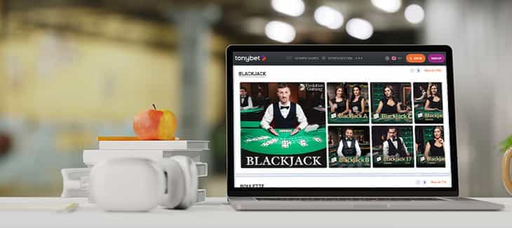 A laptop showing the live blackjack offering at TonyBet.