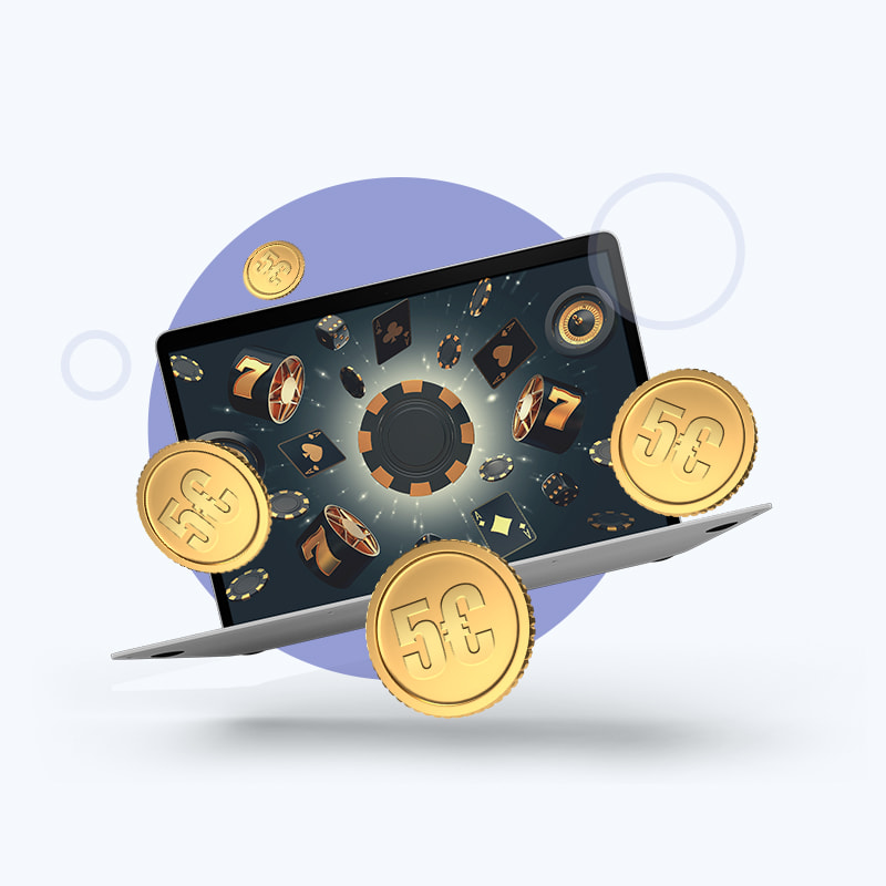 Computer con schermata di fiches e simboli, con monete con il simbolo 5€.