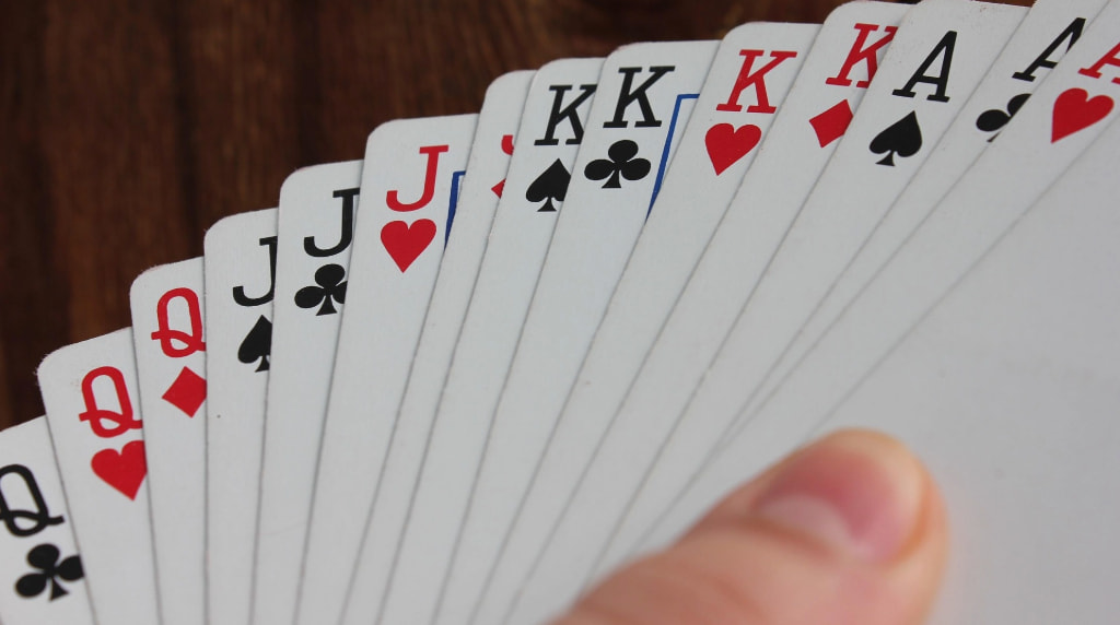 Carte da gioco con scale di Jack, Re e Assi