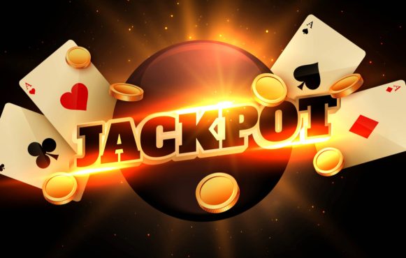 Een illustratie met het woord “jackpot”, inclusief gouden details (munten) en speelkaarten (azen)