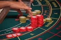 A baccarat table with a dealer.