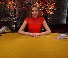 An image of a live dealer at Casino Room casino.
