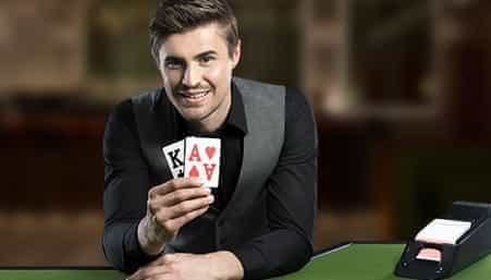 A smiling live dealer.