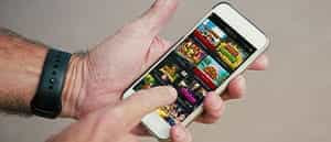 The Betway app being played on a smartphone and tablet.