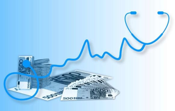 Bancnote de 500 de euro și grafic medical simbolizând instabilitatea financiară.