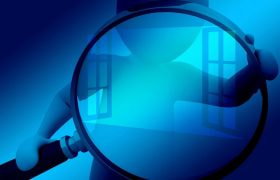 O lupă mare pe un fon albastru