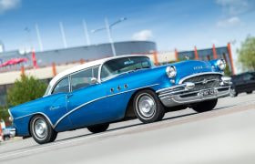 O mașină retro albastră parcată în parcare