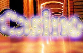 Text “Casino” pe fon portocaliu strălucitor