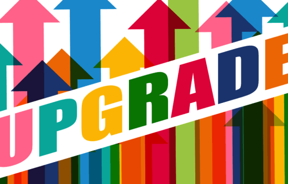 Grafică colorată cu săgeți în creștere și textul „Upgrade”