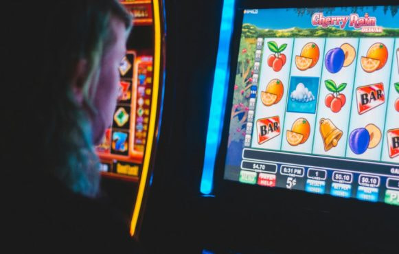 Slot player playing in a casino