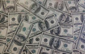 A Vast Pile of 100 Dollar Bills