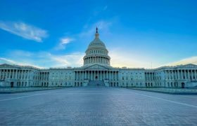 US Capitol building under blue sky
