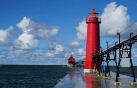 Lighthouse and pier on Lake Michigan
