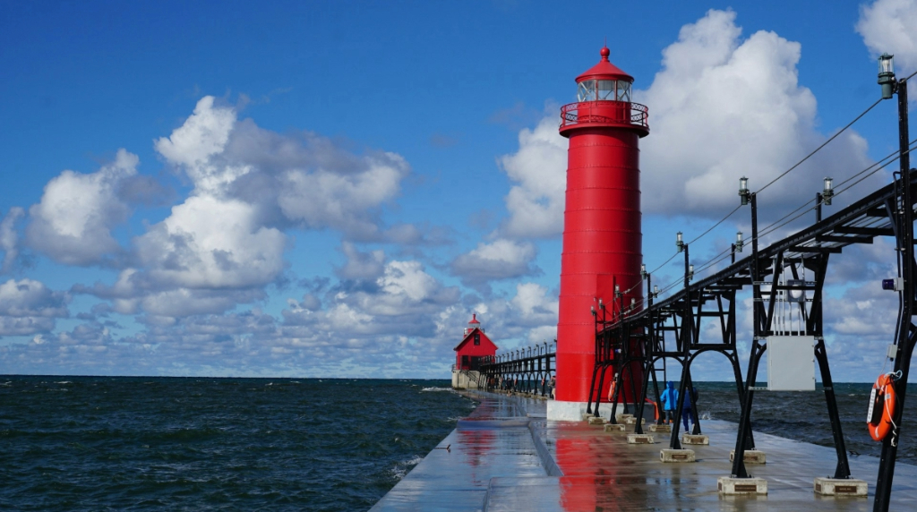 Lighthouse and pier on Lake Michigan