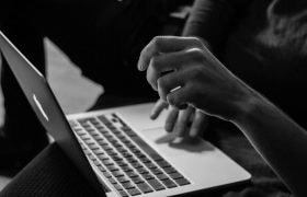 Open laptop with user