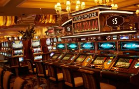 Flashing neon video poker room inside casino