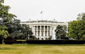 The White House under a blue sky
