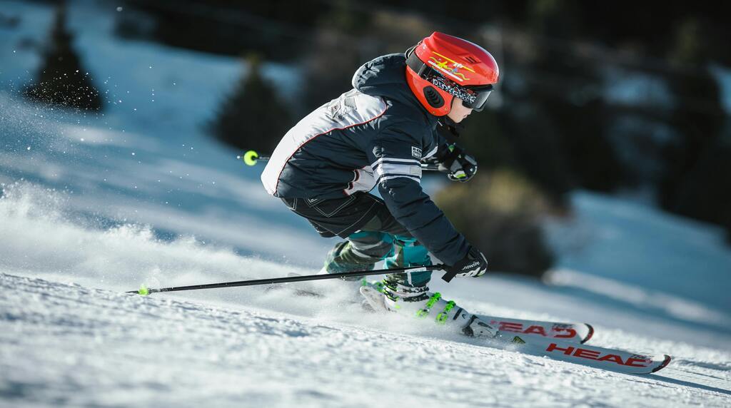 A person skiing down a slope
