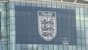 The FA logo on the side of Wembley Stadium.