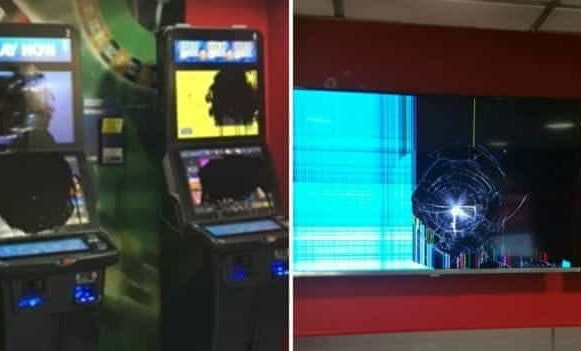 Smashed betting terminals at a William Hill Betting shop