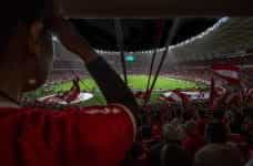 Fans in the stadium at a football match