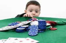 A child with casino chips.