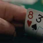 Close up of a poker players cards.