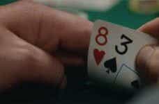 Close up of a poker players cards.