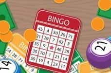 A bingo card and lotto balls.