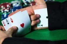 A playing card up a sleeve.