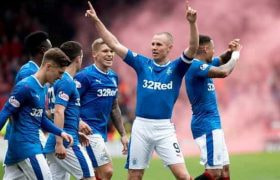 The Rangers kit with 32Red sponsorship visible on the front.