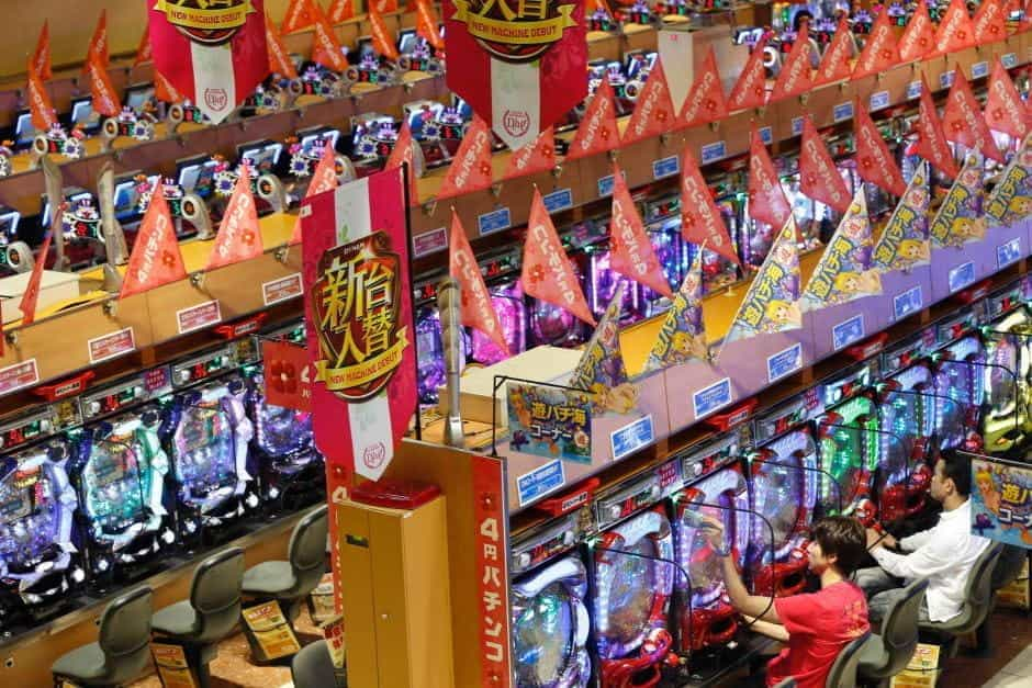 A line of pachinko machines in a parlor.