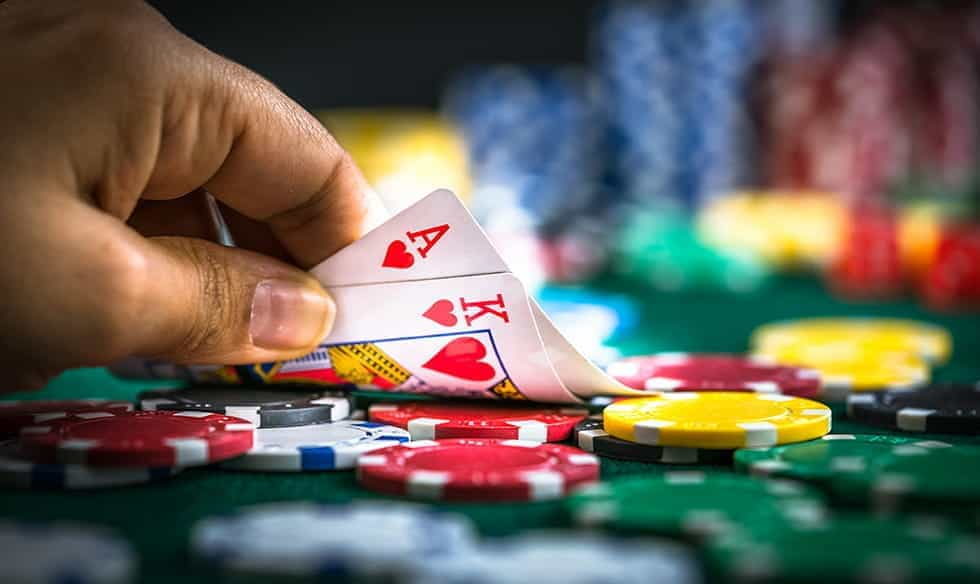 A blackjack hand being revealed.