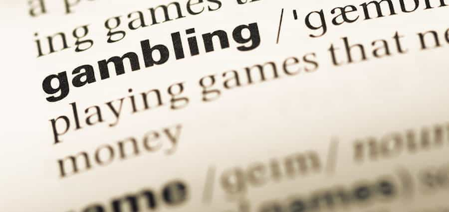 The word "gambling" and its definition in a dictionary.