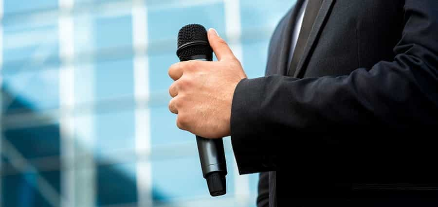 A man holding a microphone.