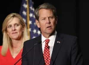 Governor Brian Kemp addresses an audience on election night. 