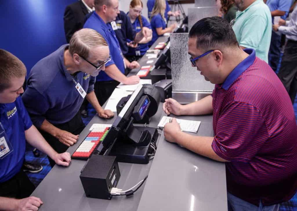 A man places a bet at a sportsbook in Iowa.