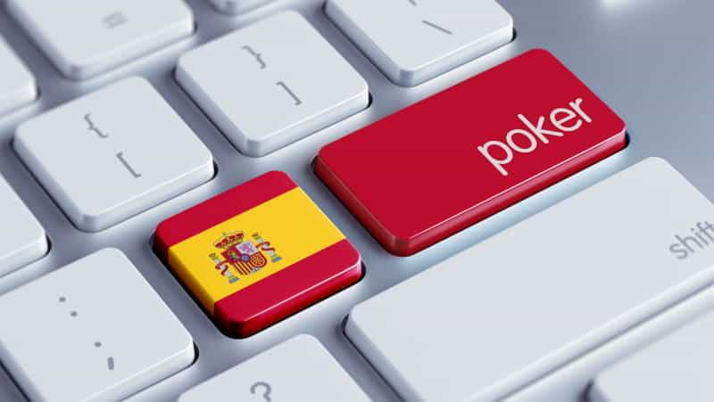 A Mac keyboard with the Spanish flag superimposed over one of the keys, and next to it, a red key with the word “poker” on it in white lettering.