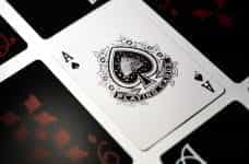 An Ace of Spades appears face up amidst face down cards.