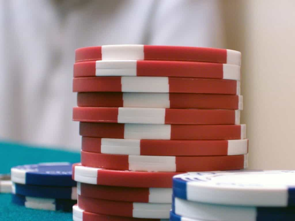 Three stacks of poker chips. 