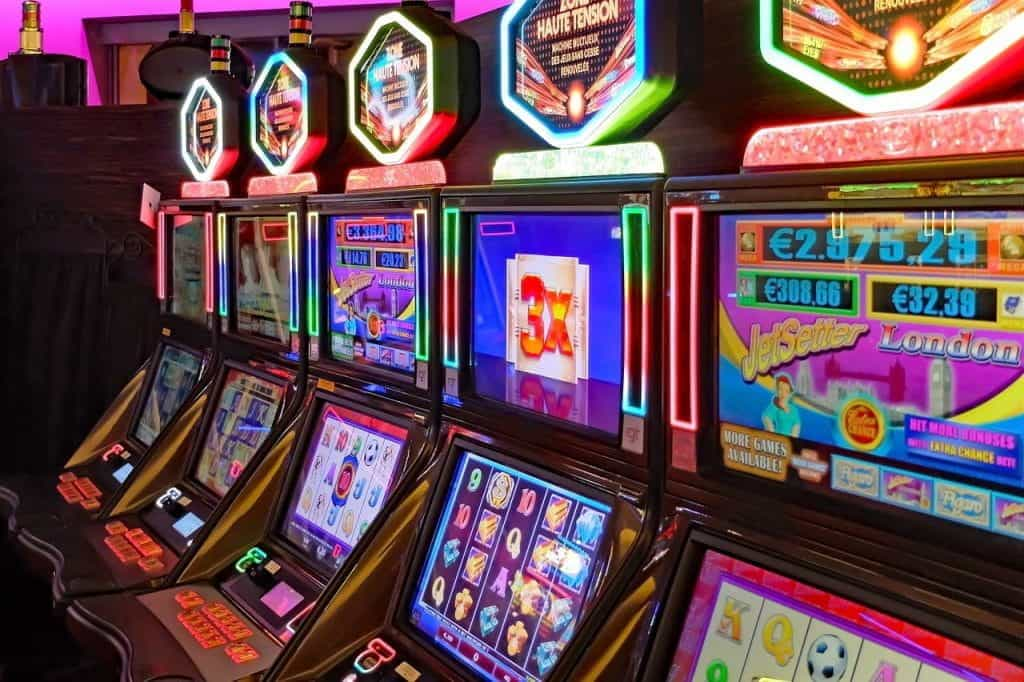 Row of slot machines in a casino.