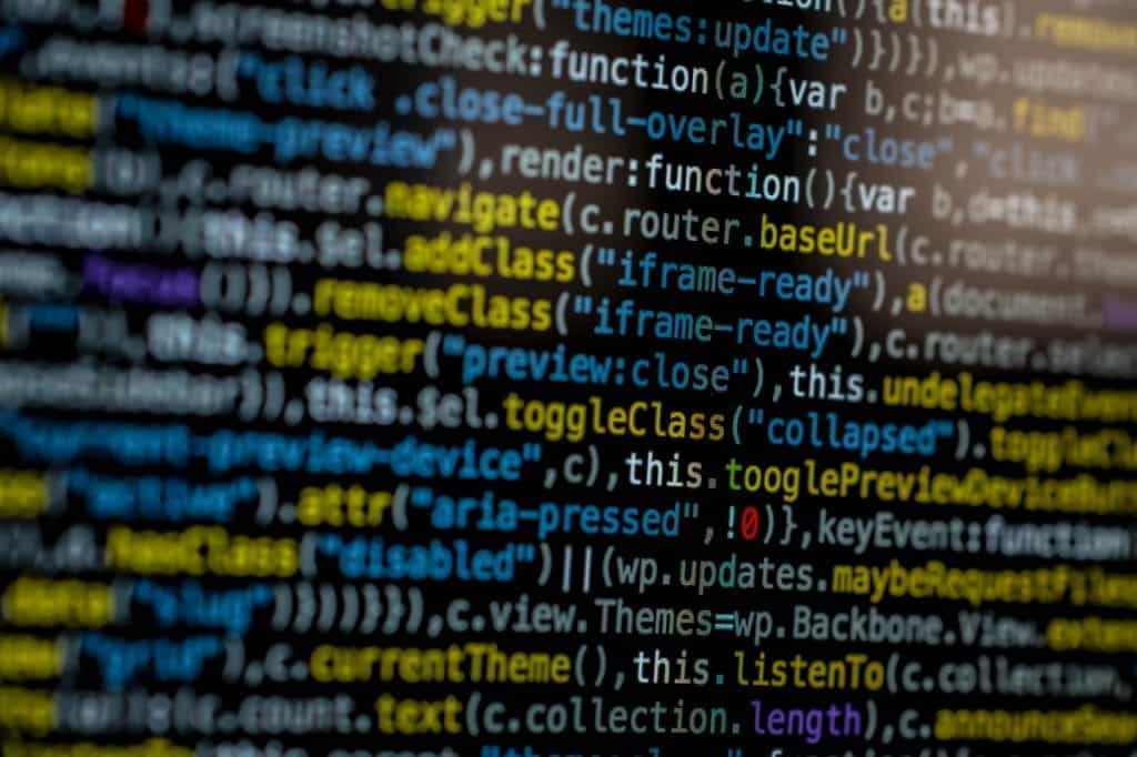 A long stream of multicolored code on a black screen.