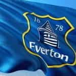Blue flag with Everton emblem on it.