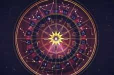 An astrological chart laid over a roulette wheel.