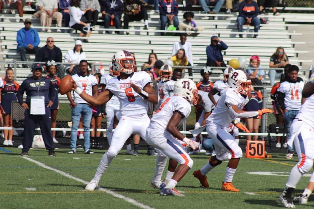 A football team in Howard County, Maryland in mid-play.