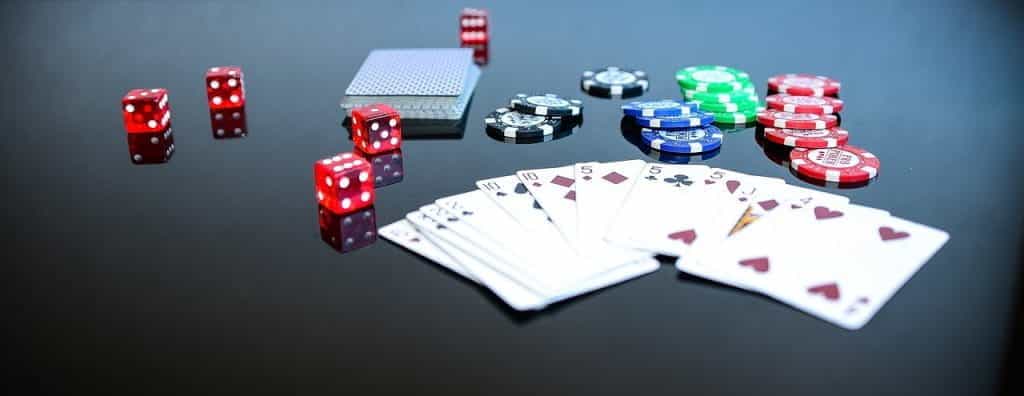Poker game elements on a transparent surface.