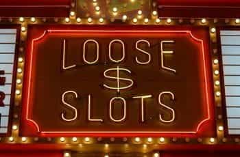 Neon 'Loose & Slots' sign from a Las Vegas casino.
