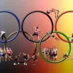 The Olympic rings and several representative athletes.