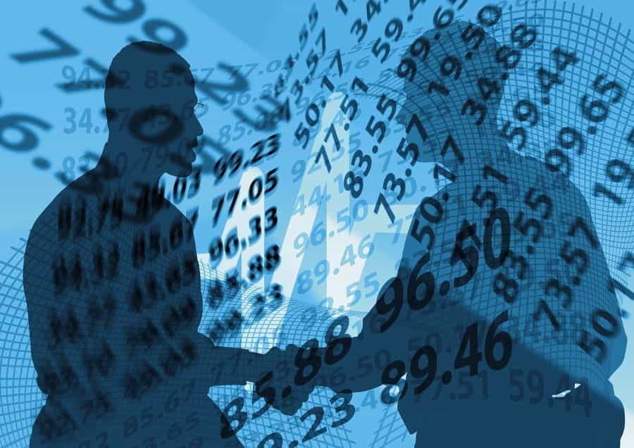 A blue computer graphic of two silhouettes shaking hands behind a web of computer code.