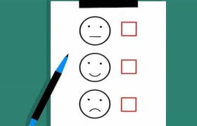 Clipboard survey graphic with pen.